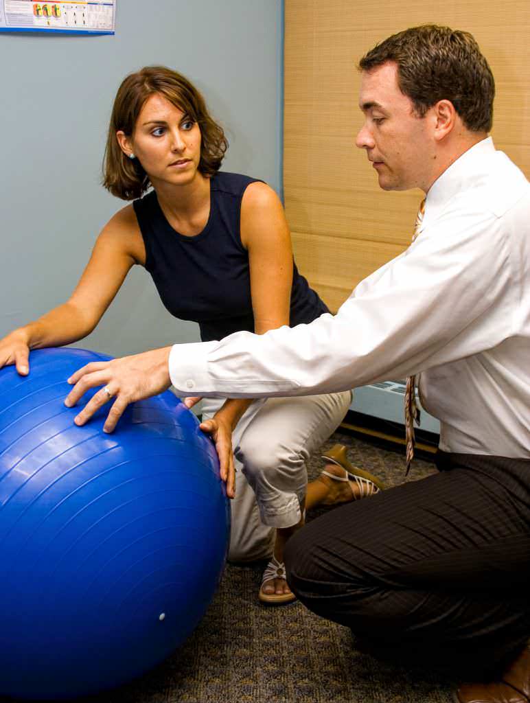 image of Dr French explaining an exercise for lower back pain